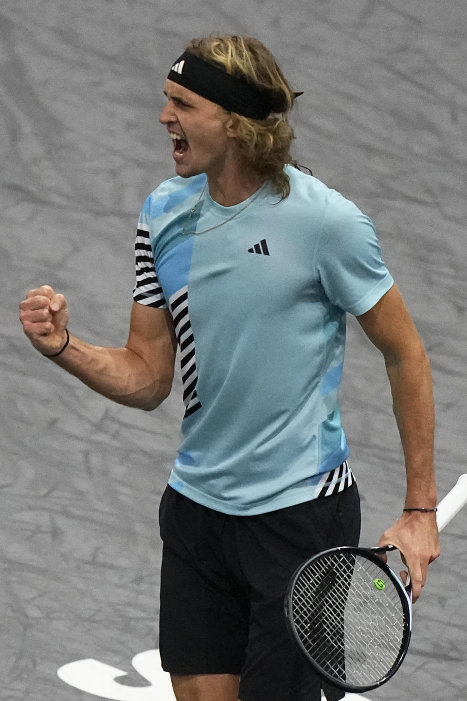 Germany's Alexander Zverev celebrates winning a point as he plays Greece's Stefanos Tsitsipas during their third round match of the Paris Masters tennis tournament, at the Accor Arena, Thursday Nov. 2, 2023 in Paris. (AP Photo/Michel Euler)