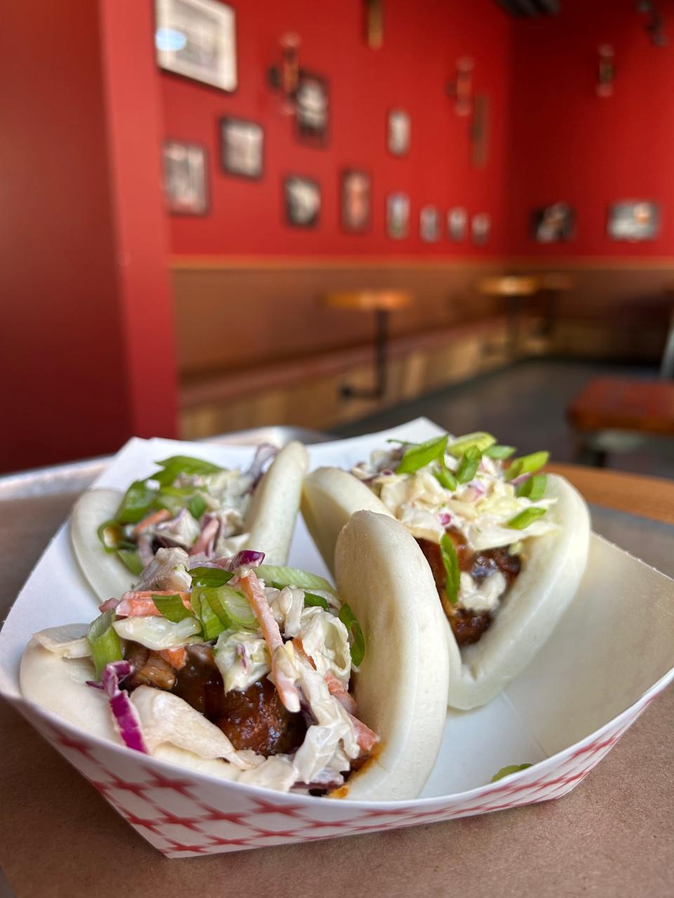 Brockton Beer Company's new updated menu comes with a variety of new food items including poutine, to pork belly adobo bao buns, "beer-ia" chicken eggrolls, soft baked pretzel, and oxtail gyro bao bun. Oct. 19, 2023.