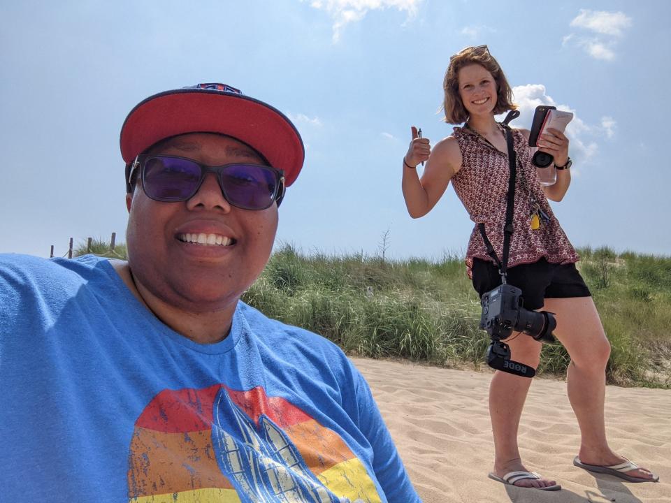 Reporter Emily Lytle and photographer Lauren Roberts interview people at Fenwick Island State Park for a story about surf-fishing and beach access.