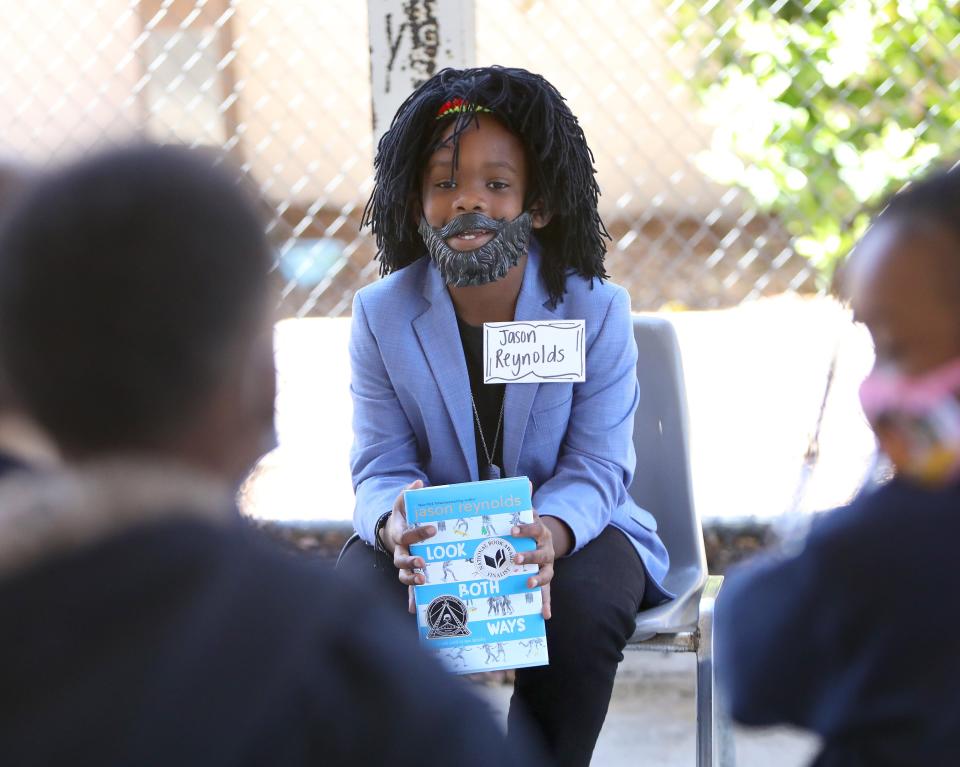 Lee Jonassaint tells about the life of his character, author Jason Reynolds, on Wednesday.