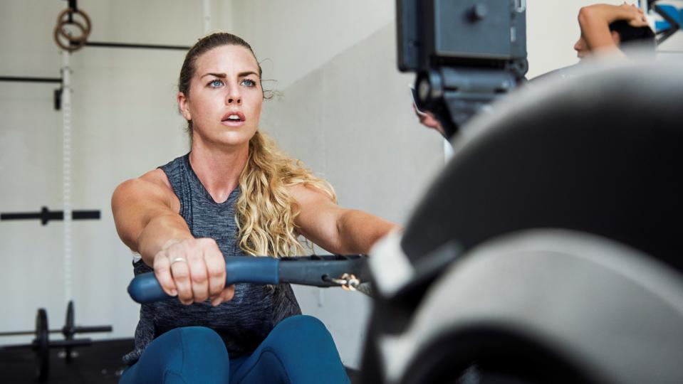 a girl on a rowing machine