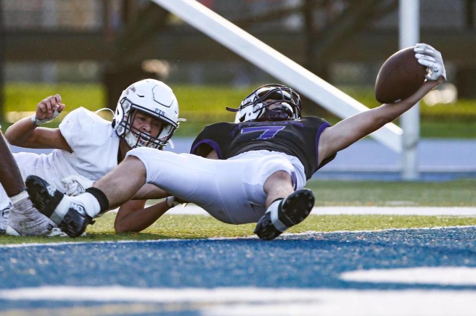 True North wide receiver Jasen “J-Roc” Lopez (7) scores a touchdown during the third quarter of a high school football playoff game against Palmer Trinity at Tropical Park in Miami, Florida, Friday, November 25, 2022.