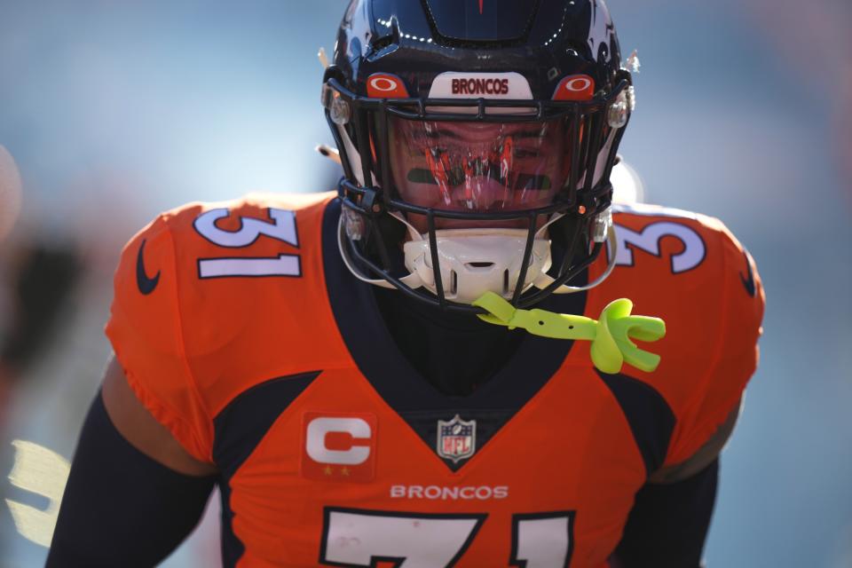 Jan 8, 2023; Denver, Colorado, USA; Denver Broncos safety Justin Simmons (31) prior to a game against the Los Angeles Chargers at Empower Field at Mile High. Mandatory Credit: Ron Chenoy-USA TODAY Sports