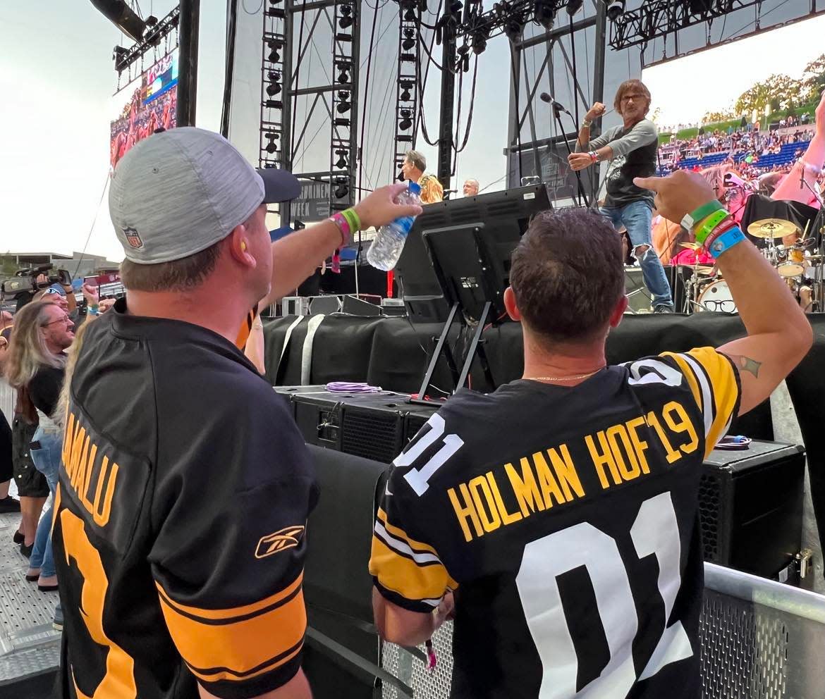 Fans enjoy the Donnie Iris concert during the Pro Football Hall of Fame Enshrinement Festival in 2022. Iris and his band opened for Journey at the Concert for Legends at Tom Benson Hall of Fame Stadium in Canton. This summer's festival headliner is the Zac Brown Band.