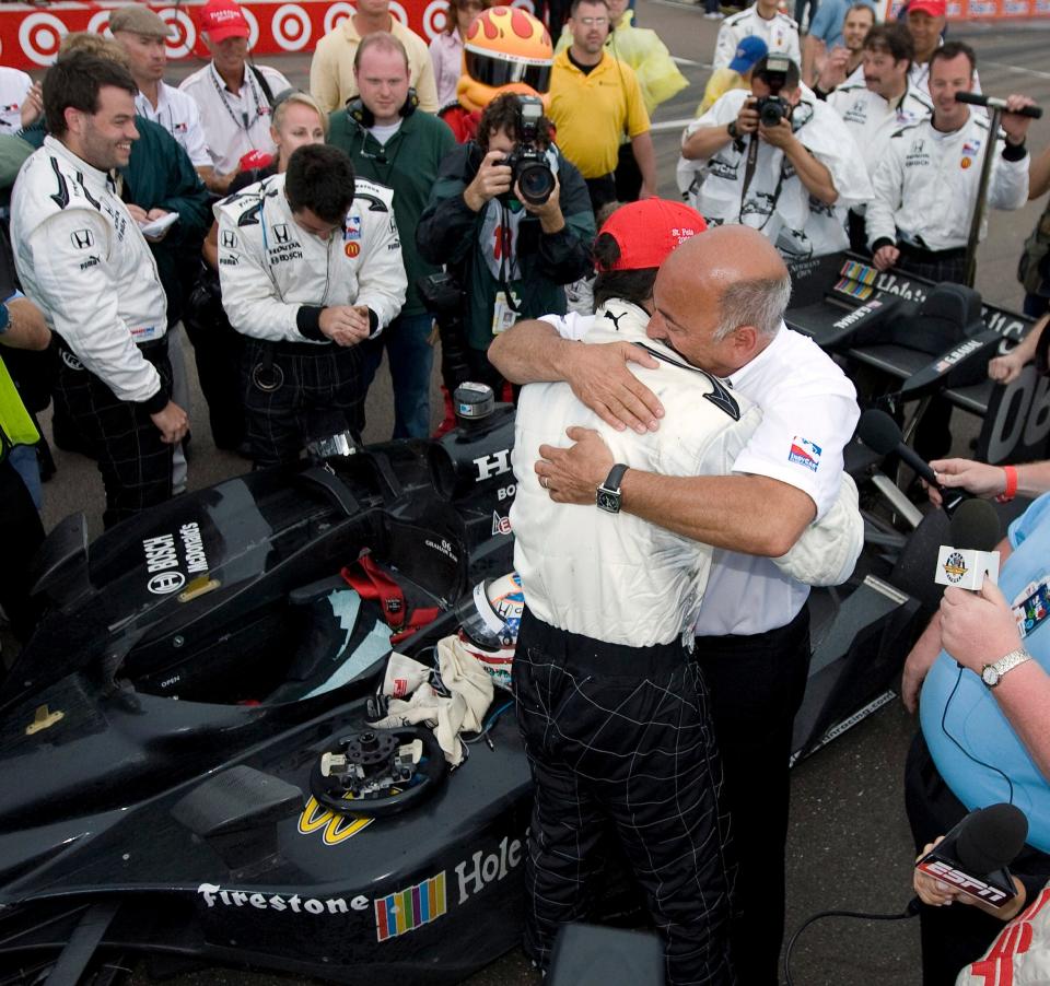 Bobby Rahal, right, embraces his son Graham Rahal, after the younger Rahal won the IRL IndyCar Series' Honda Grand Prix of St. Petersburg auto race Sunday, April 6, 2008, in St. Petersburg, Fla. Bobby Rahal is an Indianapolis 500 champion. (AP Photo/Mike Carlson)