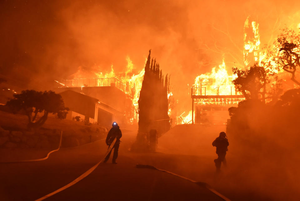 Wildfires in Southern California force thousands to flee