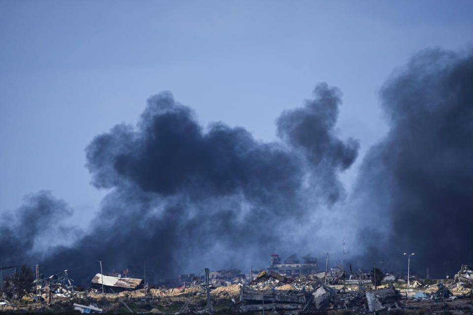 Smoke rises following an Israeli bombardment in the Gaza Strip, as seen from southern Israel, Tuesday, Jan. 30, 2024. (AP Photo/Ariel Schalit)