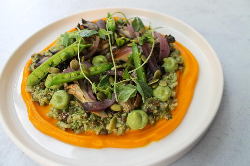 The Bridgewater's wood-burning grill will be used for more than meats. This ancient-grain salad includes onion charred at the grill plus miso sweet potato puree, snap peas, wild mushroom, avocado and cilantro pumpkin pesto.