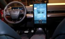 Ford Motor Co's next generation SYNC 4 communications and entertainment system on a 15.5" touchscreen display screen is seen in the interior of Ford's all-new electric Mustang Mach-E vehicle at a studio in Warren, Michigan