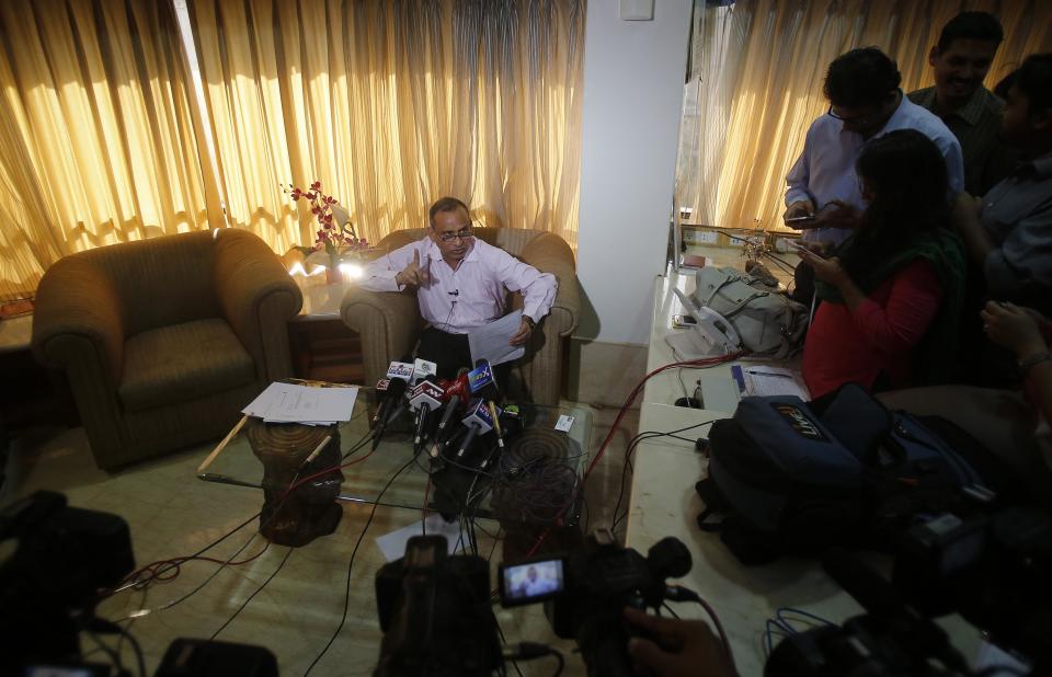 Uttam Khobragade, father of Devyani Khobragade, India's deputy consul general in New York, speaks during a news conference in Mumbai December 19, 2013. U.S. Secretary of Sate John Kerry called a top Indian official and voiced regret about the case of an Indian diplomat strip-searched after her arrest last week on charges of visa fraud, the U.S. State Department said on Wednesday. REUTERS/Danish Siddiqui (INDIA - Tags: POLITICS)