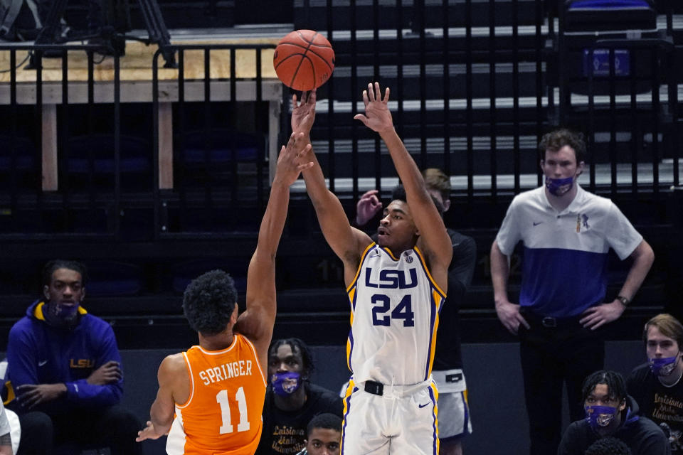 LSU guard Cameron Thomas (24) shoots over Tennessee guard Jaden Springer (11) in the second half of an NCAA college basketball game in Baton Rouge, La., Saturday, Feb. 13, 2021. (AP Photo/Gerald Herbert)
