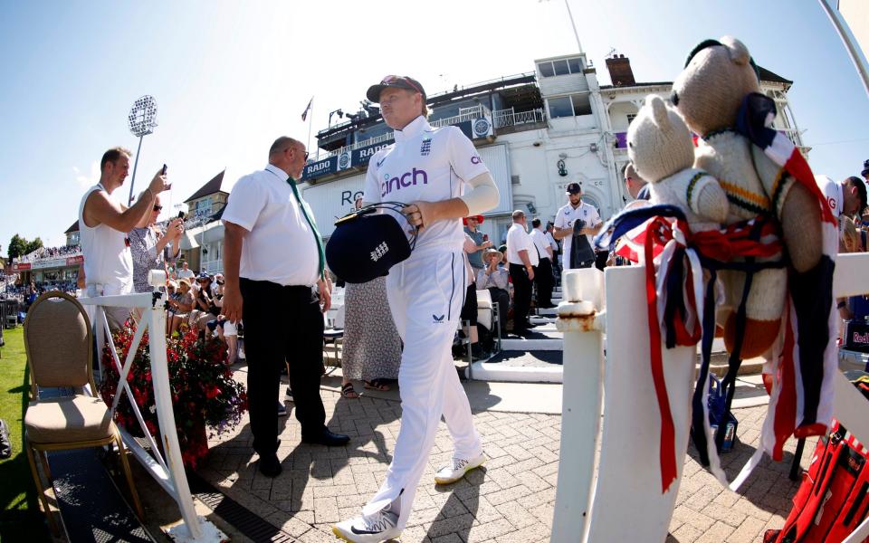 The England team walk onto the field