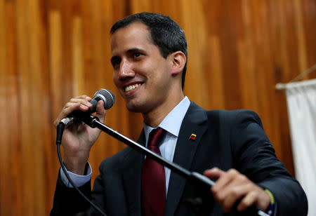 Venezuelan opposition leader Juan Guaido speaks during a meeting with representatives of FEDEAGRO, the Confederation of Associations of Agricultural Producers of Venezuela, in Caracas, Venezuela February 6, 2019. REUTERS/Carlos Garcia Rawlins