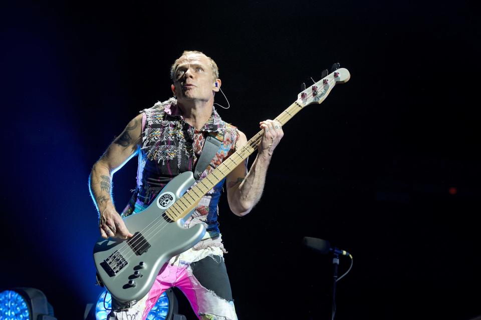 The Red Hot Chili Peppers performed at the (then-named) U.S. Bank Arena on Friday, May 19, 2017, with opening acts Jack Iron and Irontom. Flea of the Red Hot Chili Peppers performs.