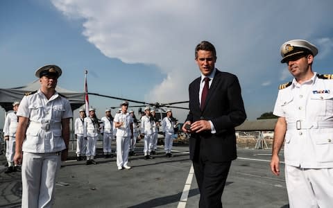 Gavin Williamson, UK defence secretary, tours the HMS Sutherland in Singapore - Credit: Yong Teck Lim /AP