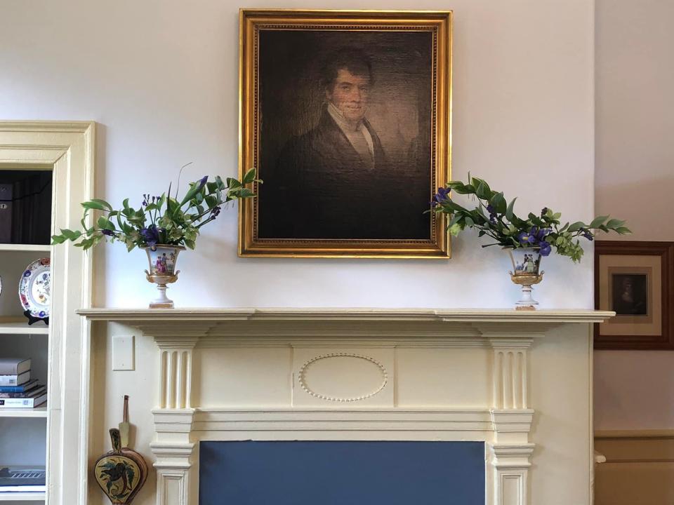 A portrait of John Banister, the first mayor of Petersburg, on display at historic Battersea villa. The floral designs were on exhibit during the 2022 Historic Garden Week tour hosted by the Petersburg Garden Club.