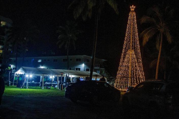 The North Bay Village commission meeting was held in a tent in a local dog park on Tuesday, Dec. 8, 2020, for COVID-19 safety reasons. Before the meeting, the village held a brief Christmas tree-lighting ceremony nearby.