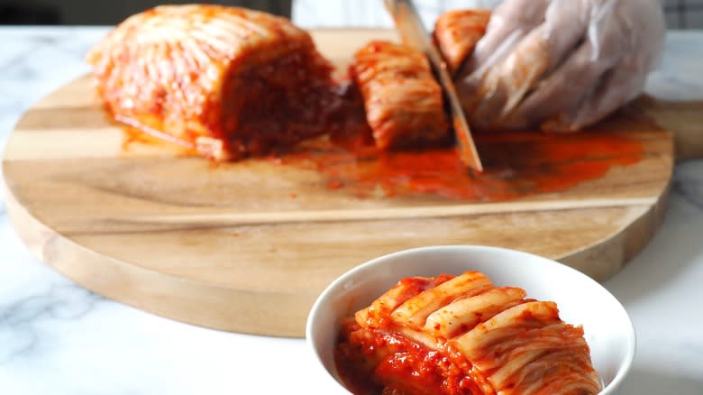 chopping kimchi, kimchi in bowl