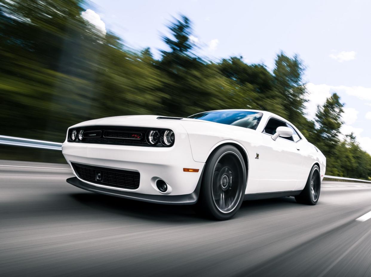 Seattle, WA, USA4/20/2022White Dodge Charger R/T driving on the street