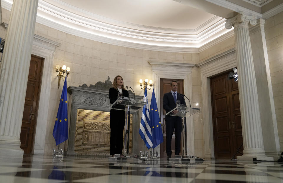 European Parliament President Roberta Metsola, left, makes statements with Greece's Prime Minister Kyriakos Mitsotakis after their meeting at Maximos Mansion in Athens, Greece, Tuesday, Feb. 20, 2024. Metsola is in Athens on Tuesday, as part of her campaign to raise awareness and encourage people to vote in the European Parliament elections in June. (AP Photo/Thanassis Stavrakis)