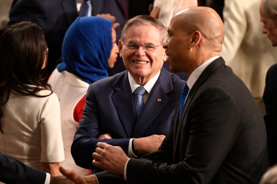 Sen. Bob Menendez (D-N.J.) and Sen. Cory Booker (D-N.J.) talk before President Donald Trump delivers the State of the Union address. 