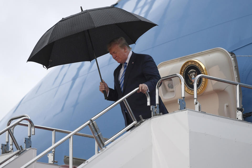 President Donald Trump walks down the steps of Air Force One at Osaka International (Itami) Airport, in Osaka, Japan, Thursday, June 27, 2019. Trump is in Osaka to attend the G20 summit. (AP Photo/Susan Walsh)