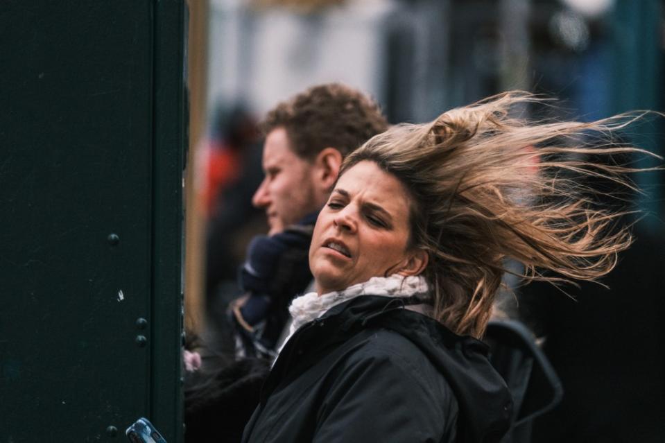 A woman battling the strong winds in lower Manhattan on March 11, 2024. Stephen Yang