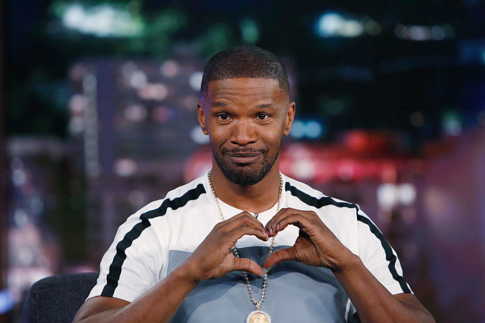 Jamie Foxx making a heart with his hands