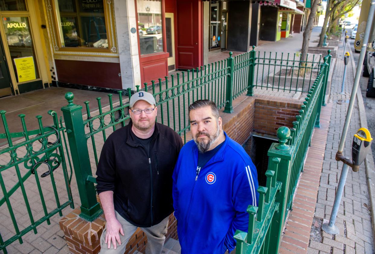 Scott Wood, left, and Raul Salazar stand at the underground entrance to the former Richard's on Main, soon to be reopened as Richard's Under Main at 311 Main Street in downtown Peoria.