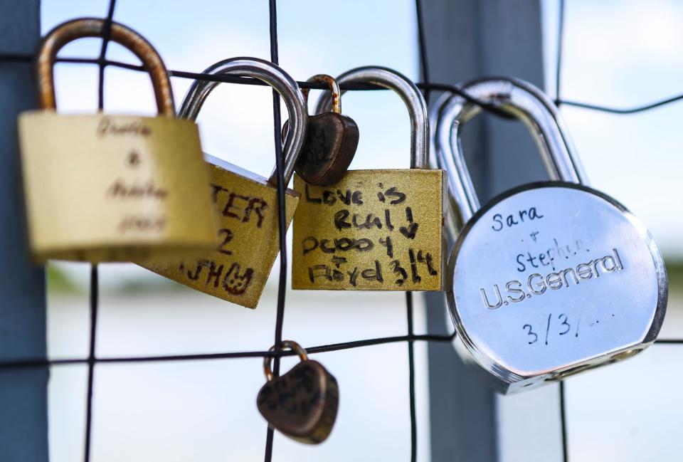 Joe Huber's Family Farm and Restaurant has a Love Lock Bridge outside the popular eatery in Starlight, Ind. People can bring a lock or buy one to lock onto the fencing, which overlooks a small lake.