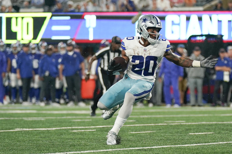 Dallas Cowboys' Tony Pollard rushes for a touchdown during the first half of an NFL football game against the New York Giants, Sunday, Sept. 10, 2023, in East Rutherford, N.J. (AP Photo/Bryan Woolston)