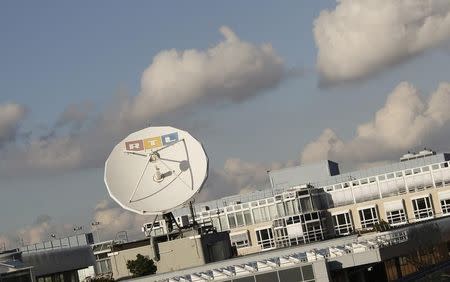 A satellite dish of RTL Television is seen on the roof of the former RTL headquarters in Cologne November 12, 2012. REUTERS/Wolfgang Rattay