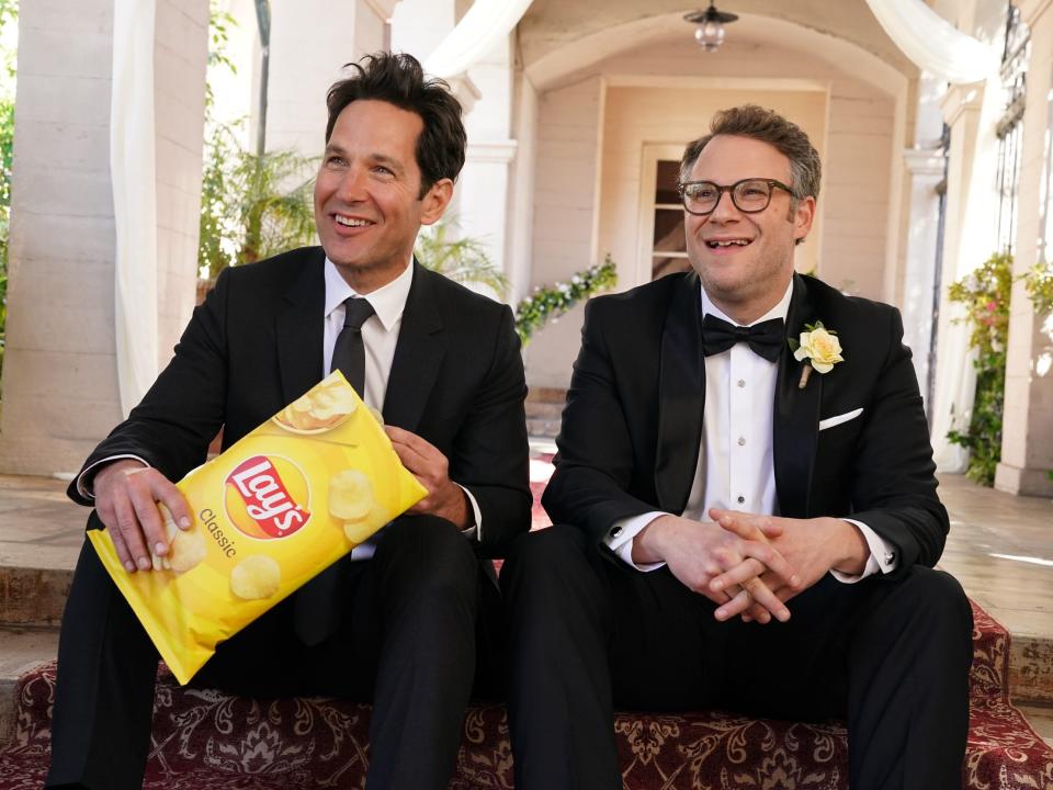 Paul Rudd and Seth Rogen in suits