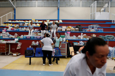 Medicine are pictured in a provisional hospital on a basketball court after an earthquake that struck the southern coast of Mexico late on Thursday, in Juchitan, Mexico, September 9, 2017. REUTERS/Carlos Jasso