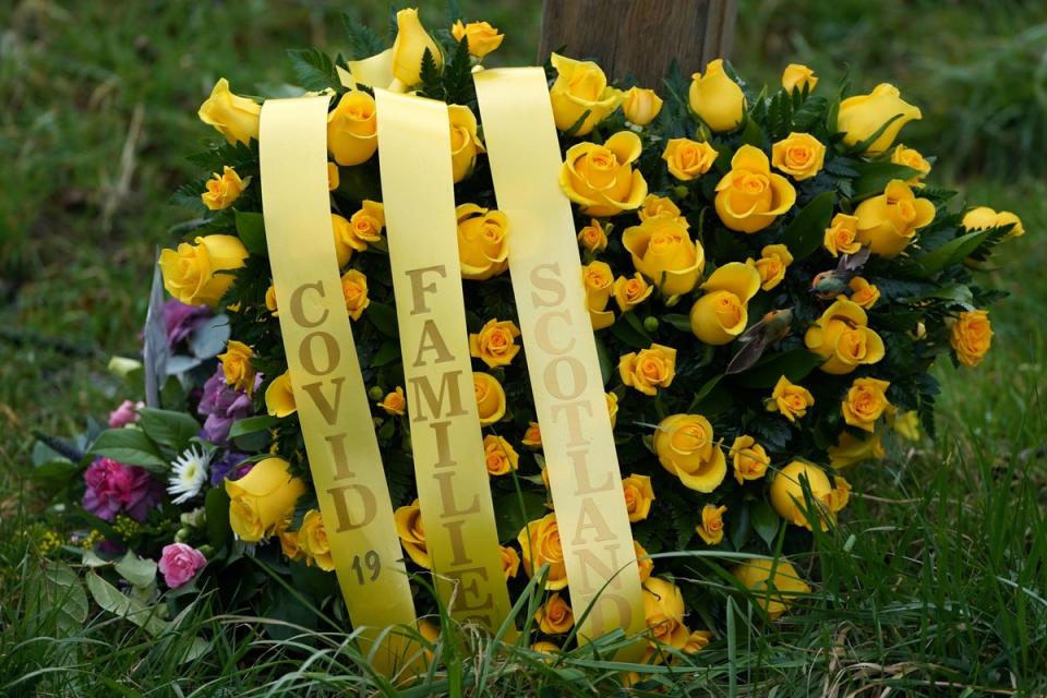 A wreath sits at Scotland's Covid Memorial in Glasgow (PA)