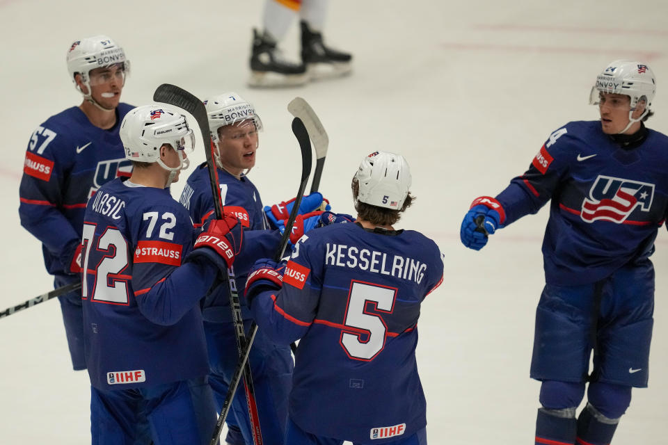 Unted States' Brady Tkachuk celebrates with teammates after scoring his side's opening goal during the preliminary round match between United States and Germany at the Ice Hockey World Championships in Ostrava, Czech Republic, Saturday, May 11, 2024. (AP Photo/Darko Vojinovic)