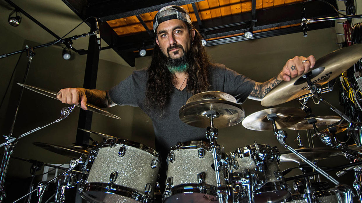  A portrait of mike portnoy at his drums. 