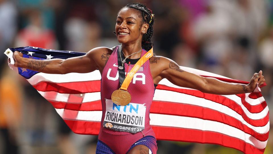 a person running with a medal