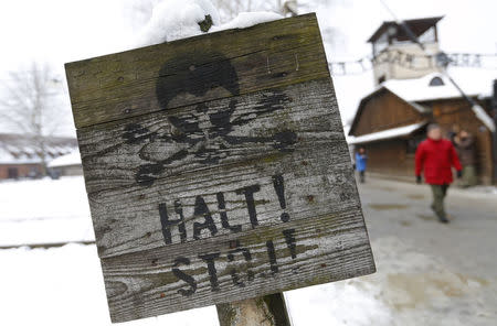 A sign is pictured in the former Nazi German concentration and extermination camp Auschwitz in Oswiecim January 26, 2015. REUTERS/Laszlo Balogh