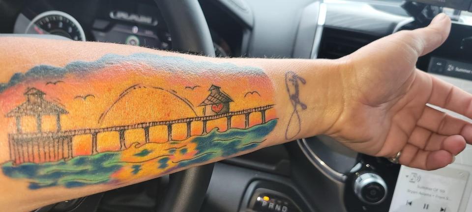 A Southwest Florida resident decided to get a tattoo of the Fort Myers Beach pier on his inner arm.
