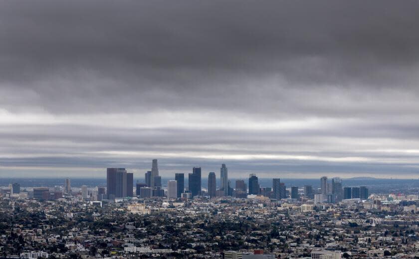 Los Angeles, CA - February 01: Storm clouds linger over the Los Angeles basin in a view from Griffith Observatory on Thursday, Feb. 1, 2024 inLos Angeles, CA. (Brian van der Brug / Los Angeles Times)