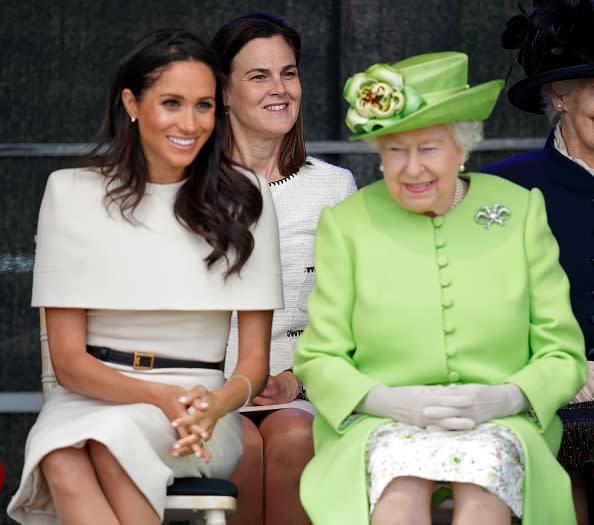 Meghan palled around with the queen last summer. (Photo: Getty Images)