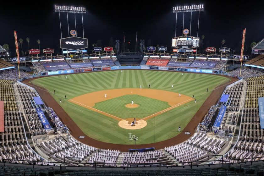 Los Angeles, CA, Thursday, Oct. 1, 2020 - The Dodgers and the Brewers in game two of the MLB Wild Card playoffs at an empty Dodger Stadium. (Robert Gauthier/ Los Angeles Times)