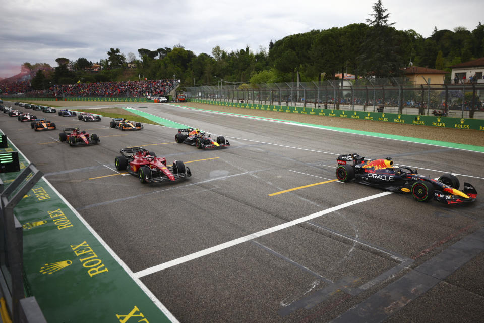 FILE - Red Bull driver Max Verstappen of the Netherlands leads at the start of the Emilia Romagna Formula One Grand Prix, at the Enzo and Dino Ferrari racetrack in Imola, Italy, Sunday, April 24, 2022. This weekend's Emilia-Romagna Grand Prix in northern Italy was canceled Wednesday, May 17, 2023, because of deadly floods in the region. Formula One said it made the decision for safety reasons and to avoid any extra burden on the emergency services, after consulting with Italian political figures. (Guglielmo Mangiapane/Pool Photo via AP, File)