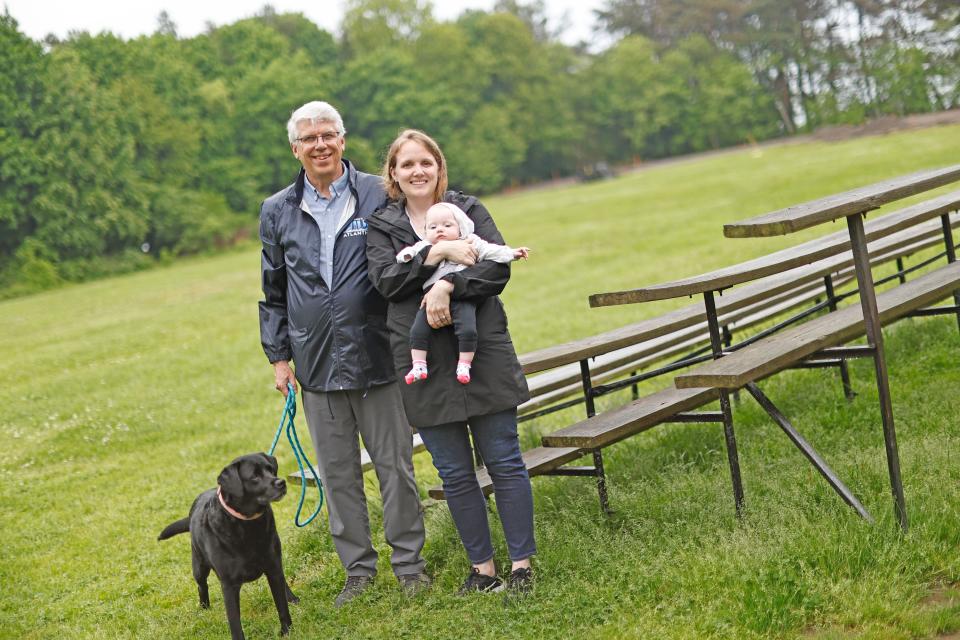 Dave Potter - shown in Quincy's Forbes Hill Park on Thursday, May 23, 2024, with his daughter Brittany Potter and granddaughter Maeve Joyce, 4 months - has been a driving force in saving the park.