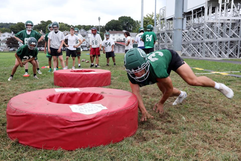 Junior Daniel Picart works out during the first day of football practice for Pleasantville High School Aug. 22, 2022 at Parkway Field in Pleasantville.