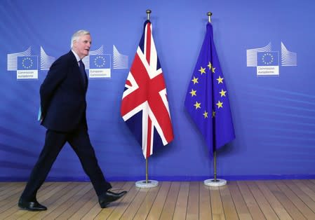EU Chief Brexit Negotiator Barnier walks at EC HQ in Brussels