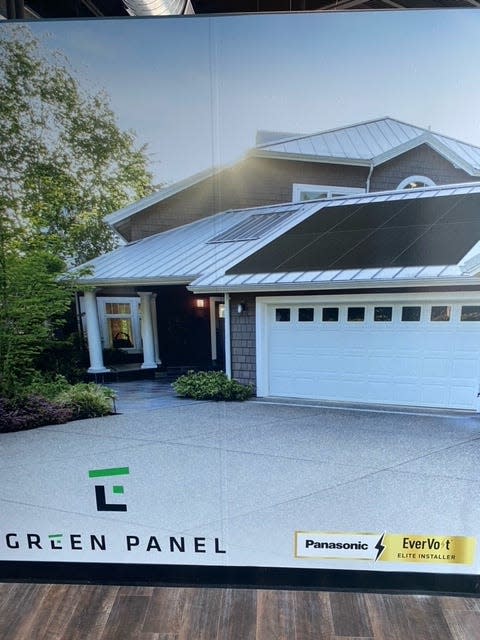 An image shows solar panels The Green Panel installed on a residence.