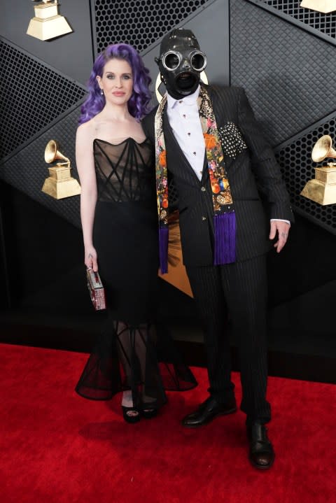 Kelly Osbourne, left, and Sid Wilson arrive at the 66th annual Grammy Awards on Sunday, Feb. 4, 2024, in Los Angeles. (Photo by Jordan Strauss/Invision/AP)