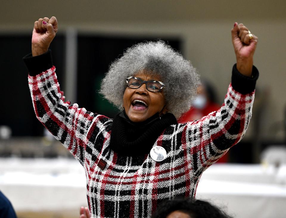 Sharon Henderson, senior leader at the Covenant St. Andrews United Methodist Church of Worcester, cheers during the 39th Annual Martin Luther King Jr. Community Breakfast Monday at Assumption University honoring Martin Luther King Jr..